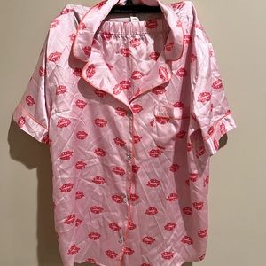 New with tags Victoria’s Secrets Satin Pajama Set in a size Large.